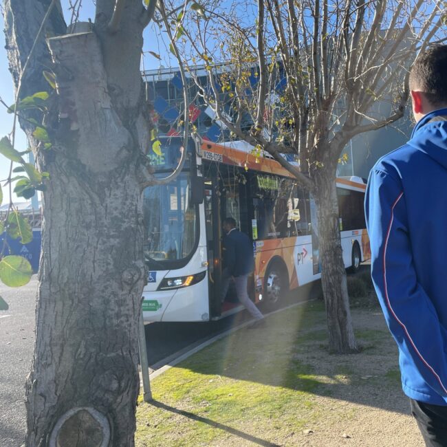 Community Partner getting onto CDC Bus