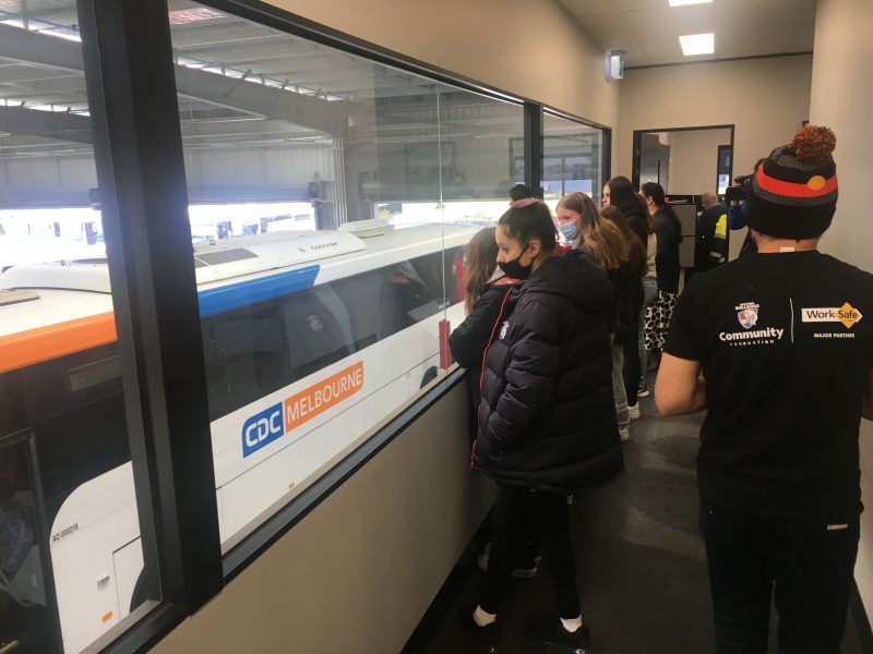 Indigenous youth overlooking the workshop at CDC Wyndham